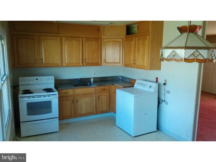 22 Queens Bridge Road Levittown, PA 19057 - Photo 4 of 14 Kitchen