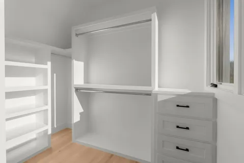 a bathroom with a sink a toilet and vanity