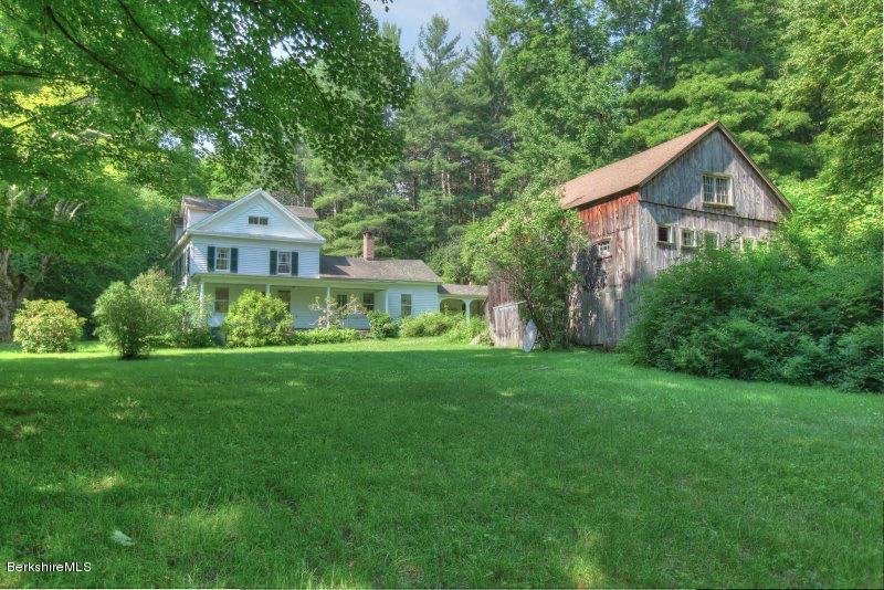 66 Fox Road Sandisfield, MA 01255 - Photo 1 of 54 a view of a house with yard and green space