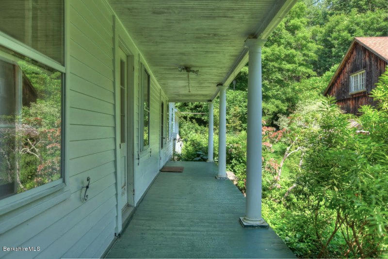 66 Fox Road Sandisfield, MA 01255 - Photo 14 of 54 a view of a porch