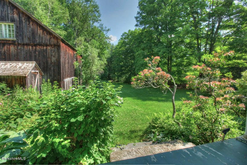 66 Fox Road Sandisfield, MA 01255 - Photo 15 of 54 a backyard of a house with lots of green space