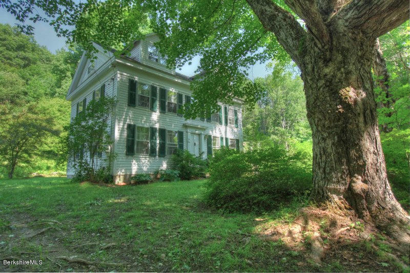 66 Fox Road Sandisfield, MA 01255 - Photo 4 of 54 front view of a house with a yard