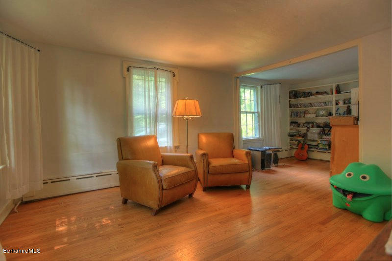 66 Fox Road Sandisfield, MA 01255 - Photo 31 of 54 a living room with furniture and a window