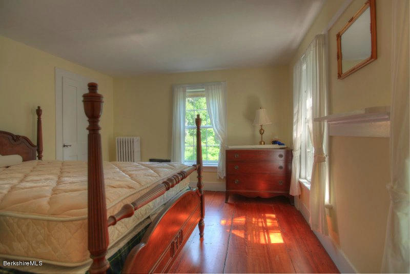 66 Fox Road Sandisfield, MA 01255 - Photo 35 of 54 a bedroom with a bed and a window
