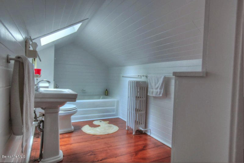 66 Fox Road Sandisfield, MA 01255 - Photo 38 of 54 a bathroom with a sink and a mirror