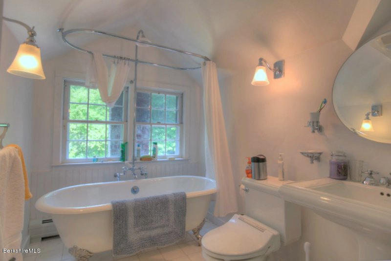 66 Fox Road Sandisfield, MA 01255 - Photo 44 of 54 a bathroom with a sink toilet bathtub and window