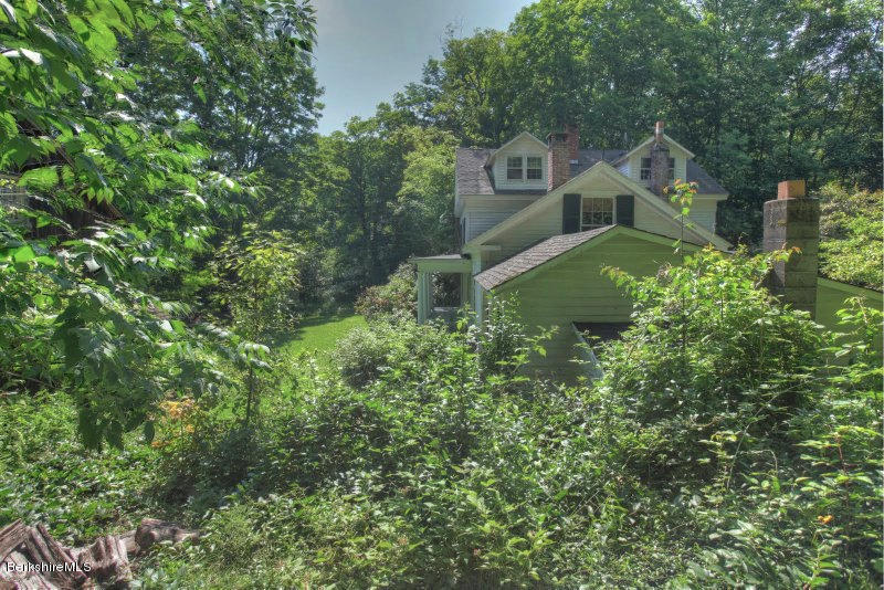 66 Fox Road Sandisfield, MA 01255 - Photo 48 of 54 a front view of a house with a yard