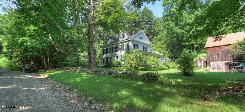 66 Fox Road Sandisfield, MA 01255 - Photo 54 of 54 a view of a garden with plants and large trees