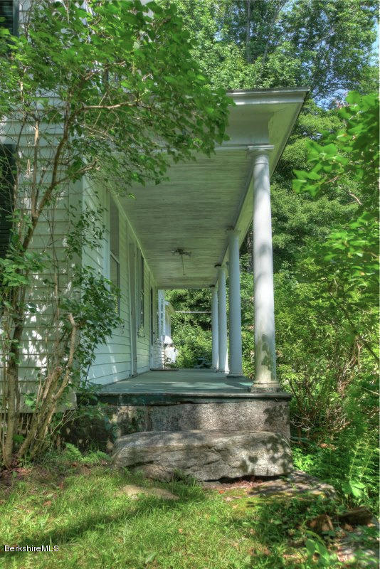 66 Fox Road Sandisfield, MA 01255 - Photo 7 of 54 a view of front door of house with green space