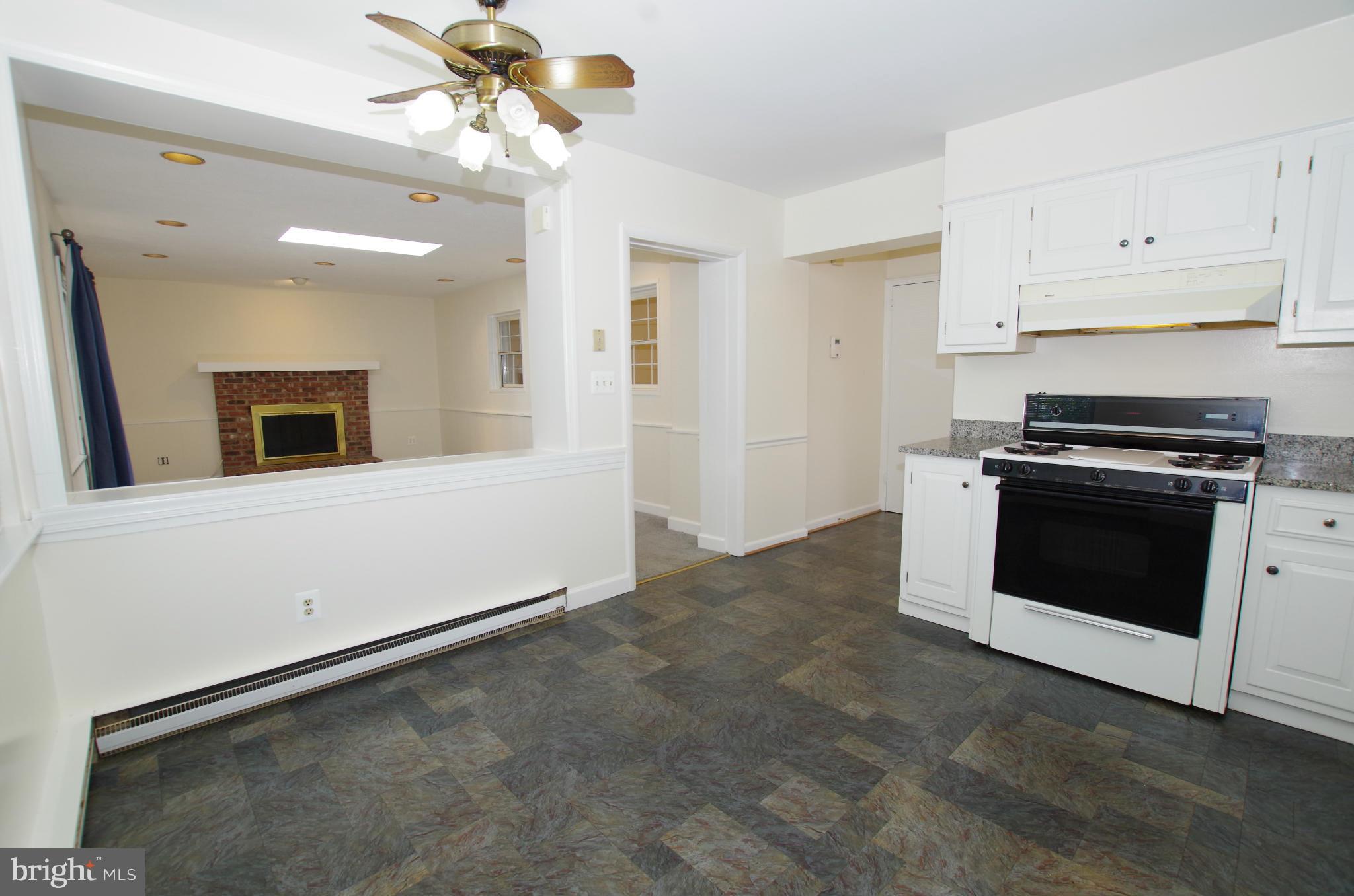 12624 Epping Road Silver Spring, MD 20906 - Photo 12 of 30 Kitchen Pass Through to Family Room