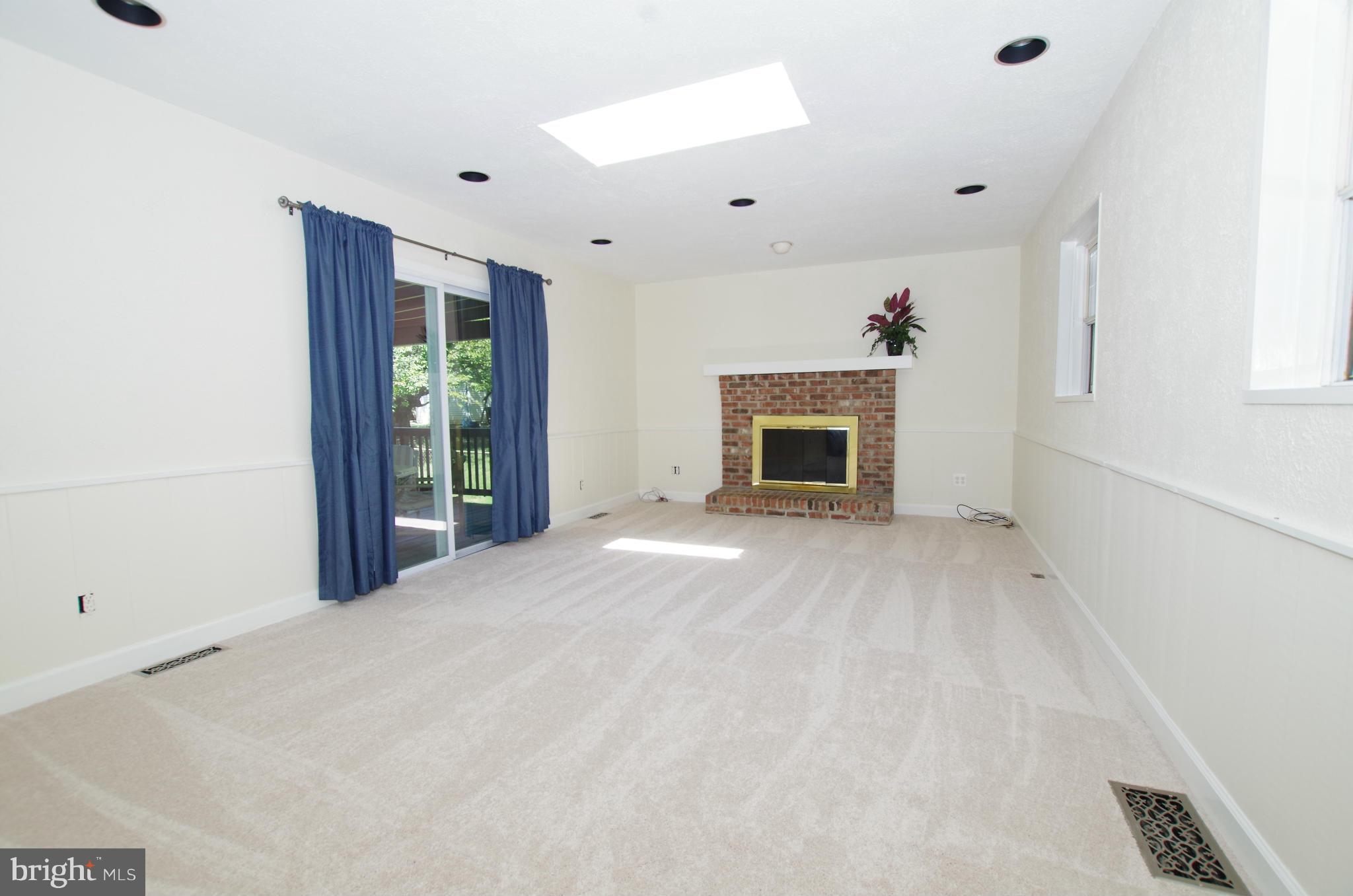 12624 Epping Road Silver Spring, MD 20906 - Photo 13 of 30 Family Room with Wood Burning Fireplace