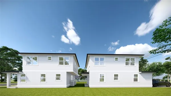 a view of house with yard