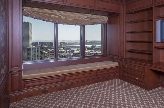 a bathroom with a bathtub and window