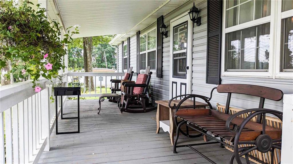 2646 Ridge Road Westover, PA 16692 - Photo 2 of 23 a view of a chairs and table in the balcony