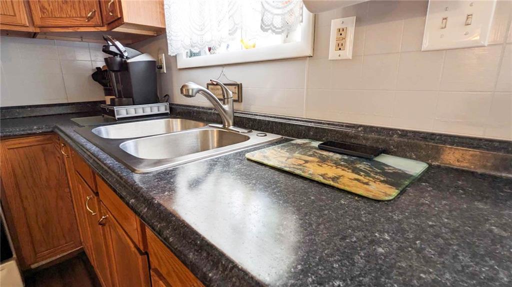 2646 Ridge Road Westover, PA 16692 - Photo 5 of 23 a kitchen with a sink a counter top space and cabinets
