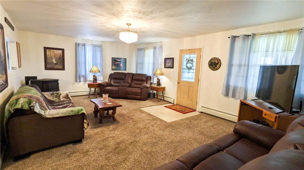 2646 Ridge Road Westover, PA 16692 - Photo 8 of 23 a living room with furniture window and a flat screen tv