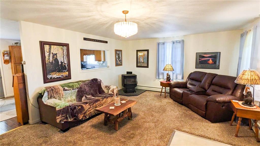 2646 Ridge Road Westover, PA 16692 - Photo 9 of 23 a living room with furniture and a fireplace