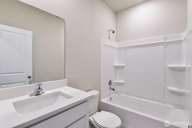 a bathroom with a sink toilet and bathtub
