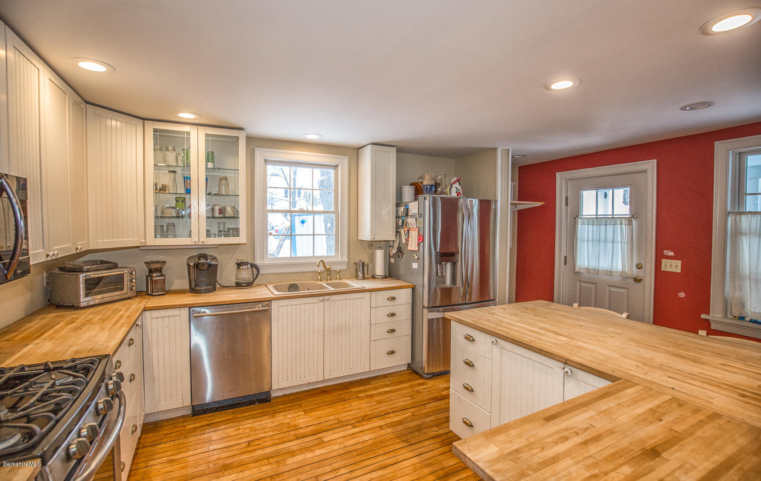 3 Tyringham Road Monterey, MA 01245 - Photo 2 of 24 a large kitchen with a sink stove and refrigerator