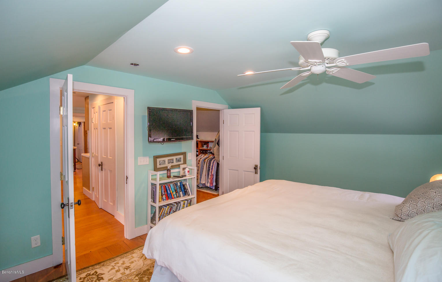 3 Tyringham Road Monterey, MA 01245 - Photo 17 of 24 a bedroom with a bed and a flat tv screen on dresser