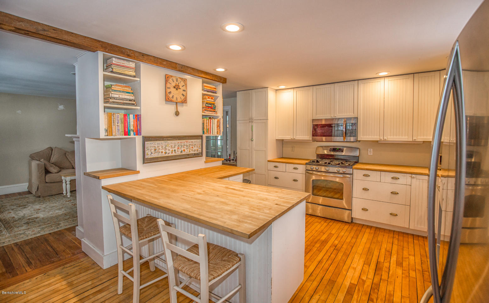 3 Tyringham Road Monterey, MA 01245 - Photo 3 of 24 a kitchen with stainless steel appliances kitchen island granite countertop a refrigerator and a stove top oven