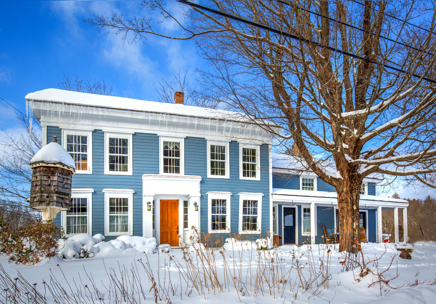 3 Tyringham Road Monterey, MA 01245 - Photo 24 of 24 a front view of a building with a yard