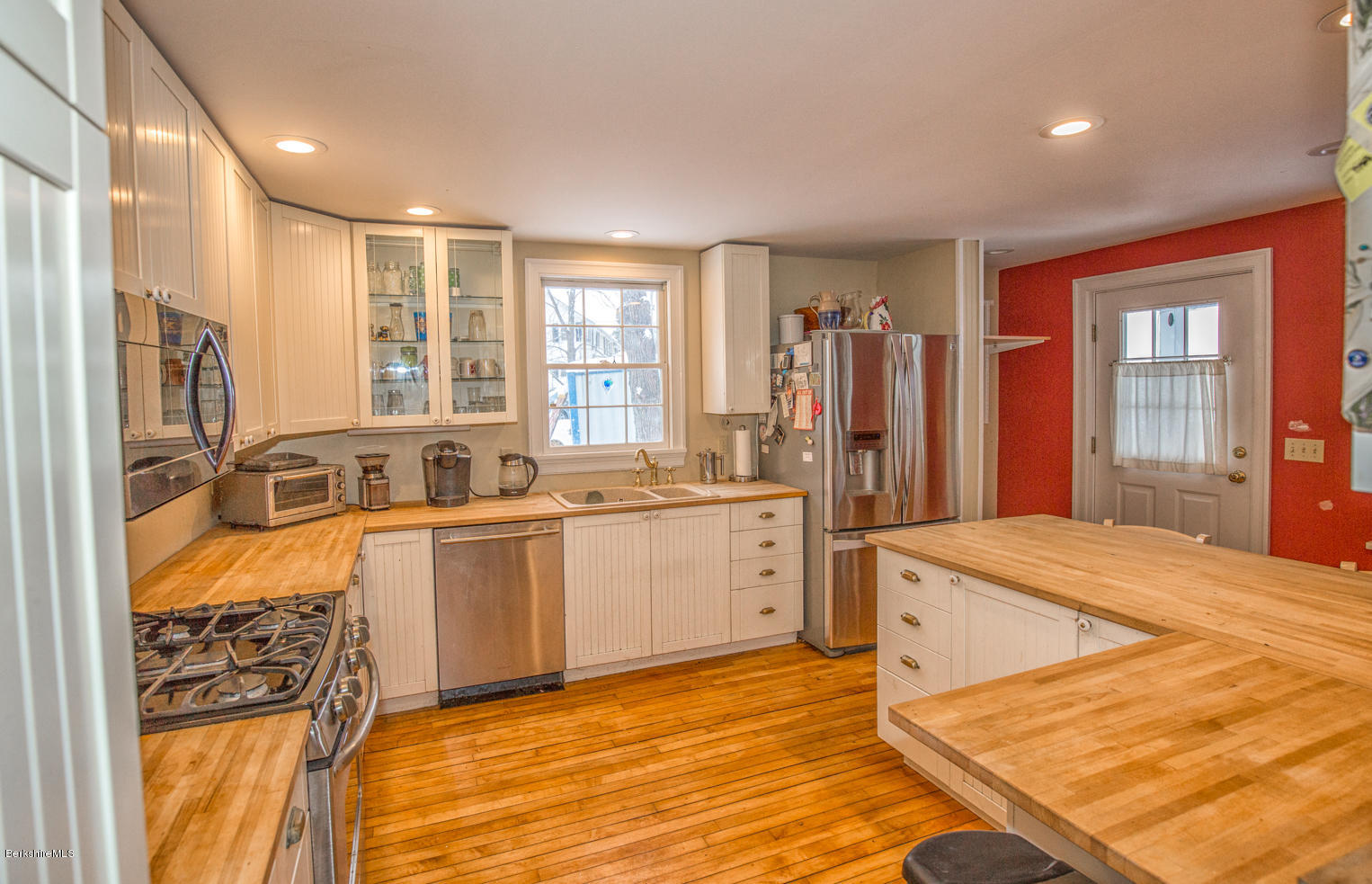 3 Tyringham Road Monterey, MA 01245 - Photo 4 of 24 a kitchen with stainless steel appliances granite countertop a sink stove and refrigerator