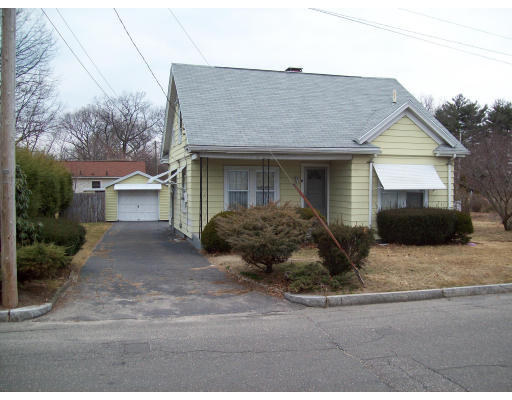 88 Nagle Street Springfield, MA 01151 - Photo 1 of 1 a front view of a house with a yard and garage