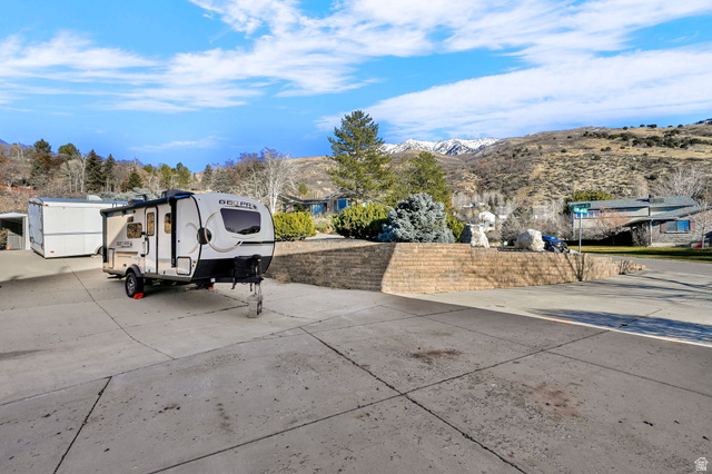 1085 Windsor Drive Provo, UT 84604 - Photo 73 of 83 View of parking / parking lot featuring a mountain view
