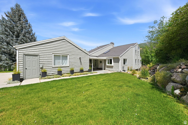 1979 Cave Hollow Way Bountiful, UT 84010 - Photo 55 of 59 Exterior elevation featuring horizontal siding and a dark gray shingle roof