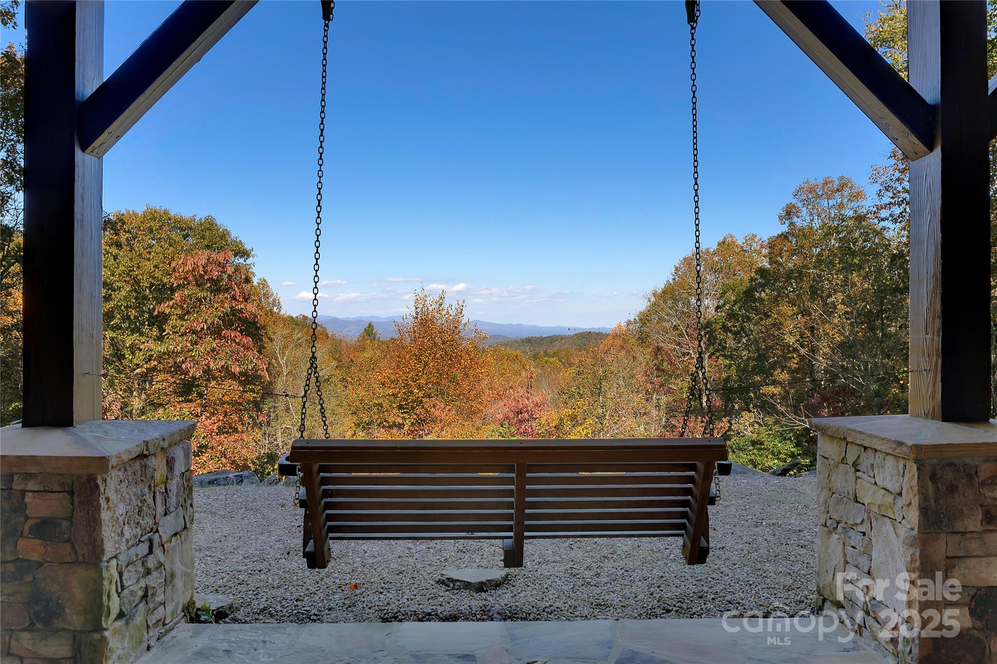 1291 Indian Camp Mountain Road Rosman, NC 28772 - Photo 2 of 48 a view of a bench in a backyard