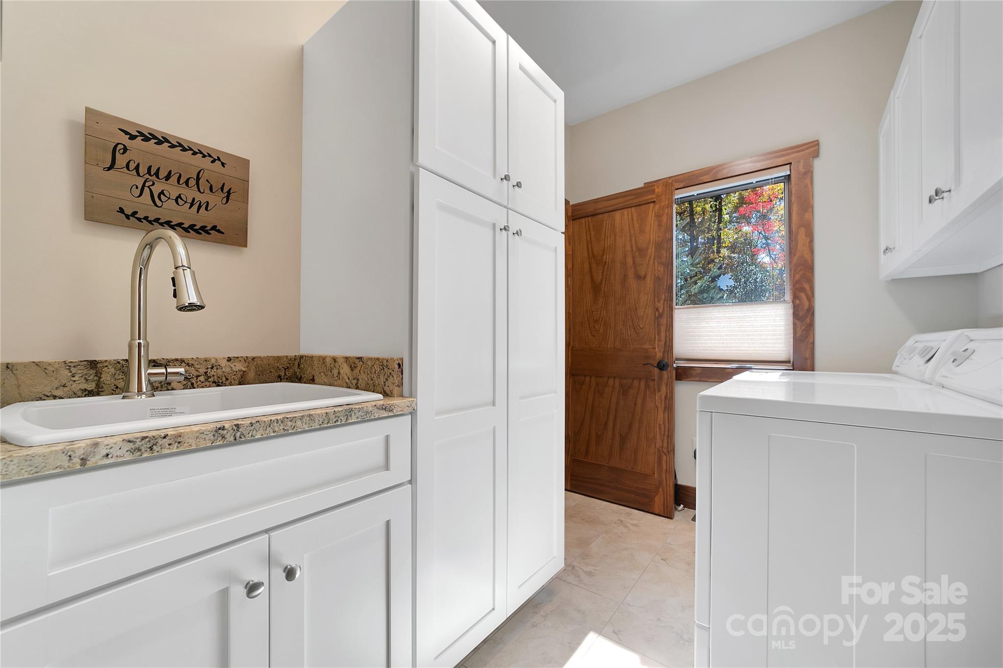 1291 Indian Camp Mountain Road Rosman, NC 28772 - Photo 21 of 48 a bathroom with a sink and a mirror