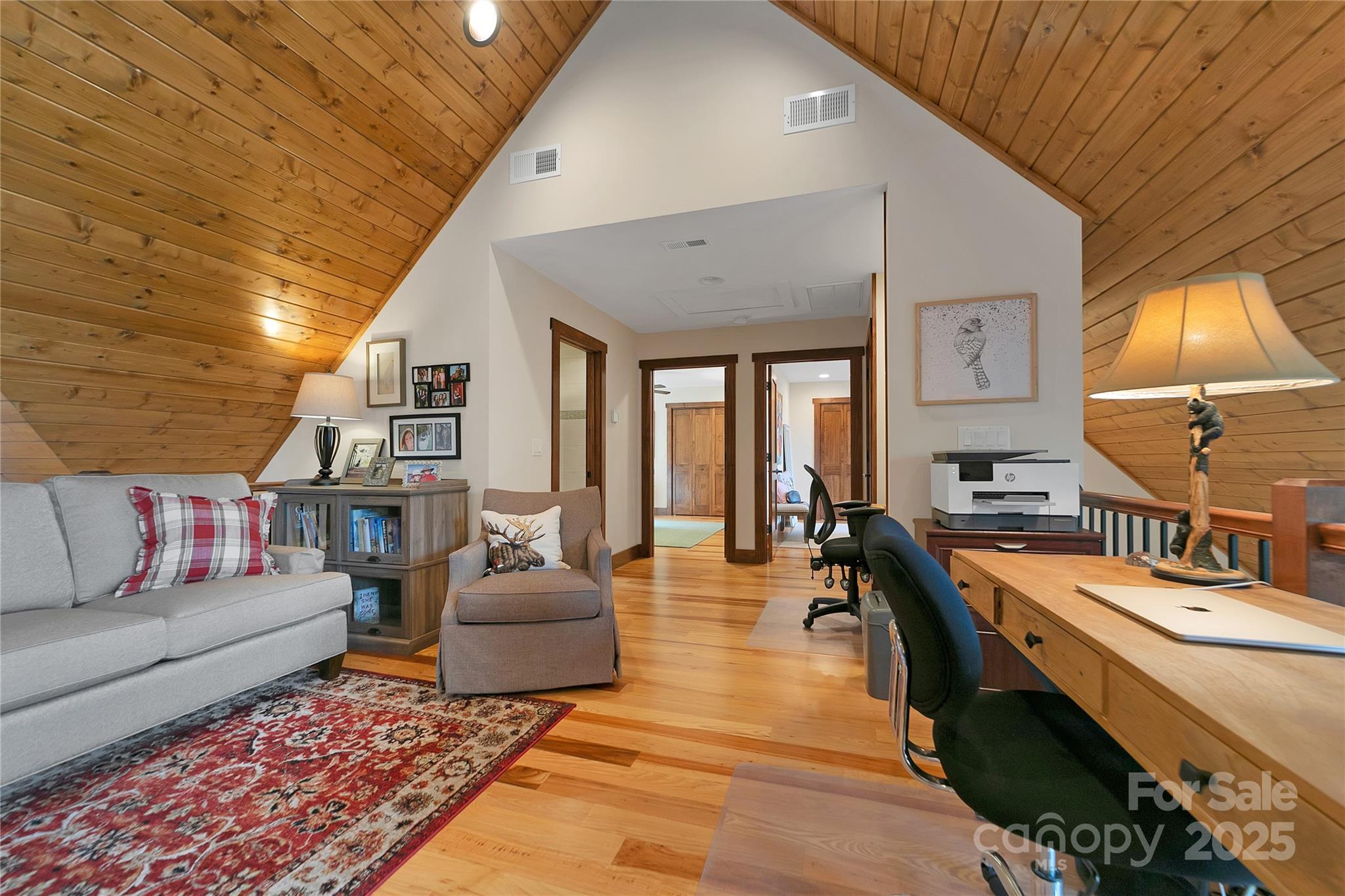 1291 Indian Camp Mountain Road Rosman, NC 28772 - Photo 27 of 48 a living room with furniture and a flat screen tv