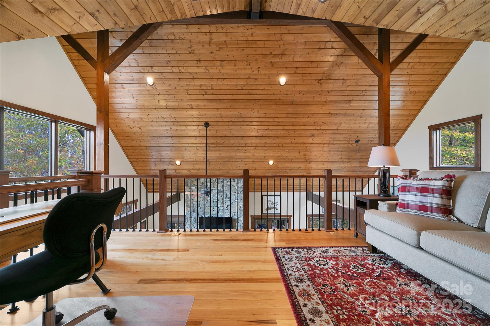 1291 Indian Camp Mountain Road Rosman, NC 28772 - Photo 28 of 48 a balcony with furniture and a rug