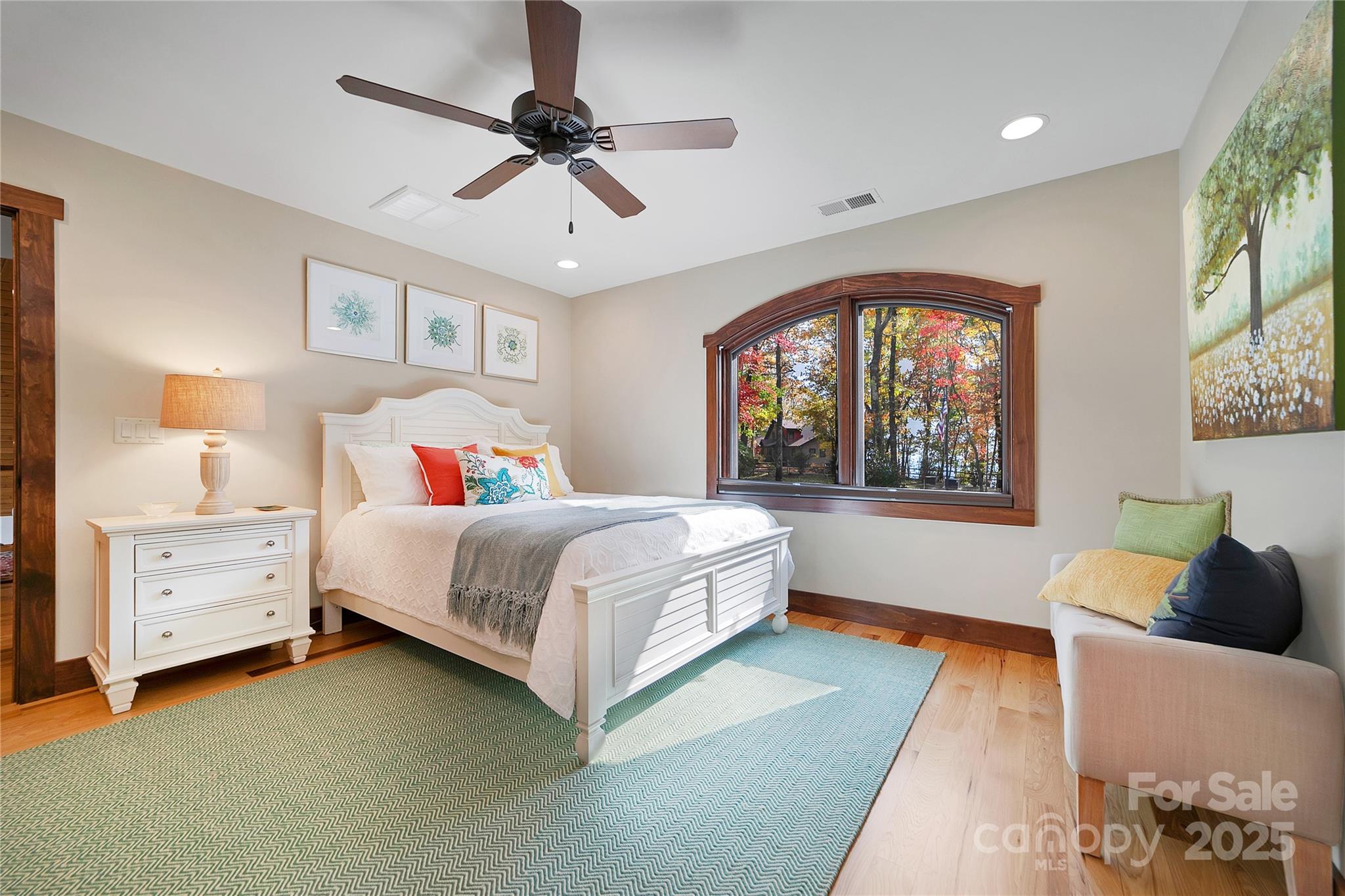 1291 Indian Camp Mountain Road Rosman, NC 28772 - Photo 30 of 48 a bedroom with a bed and a window