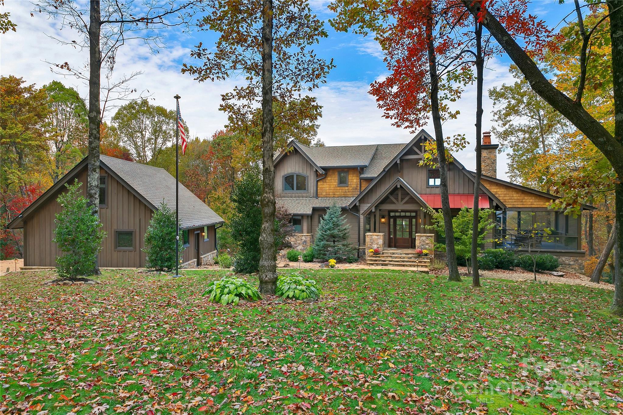 1291 Indian Camp Mountain Road Rosman, NC 28772 - Photo 3 of 48 a front view of house with yard and green space
