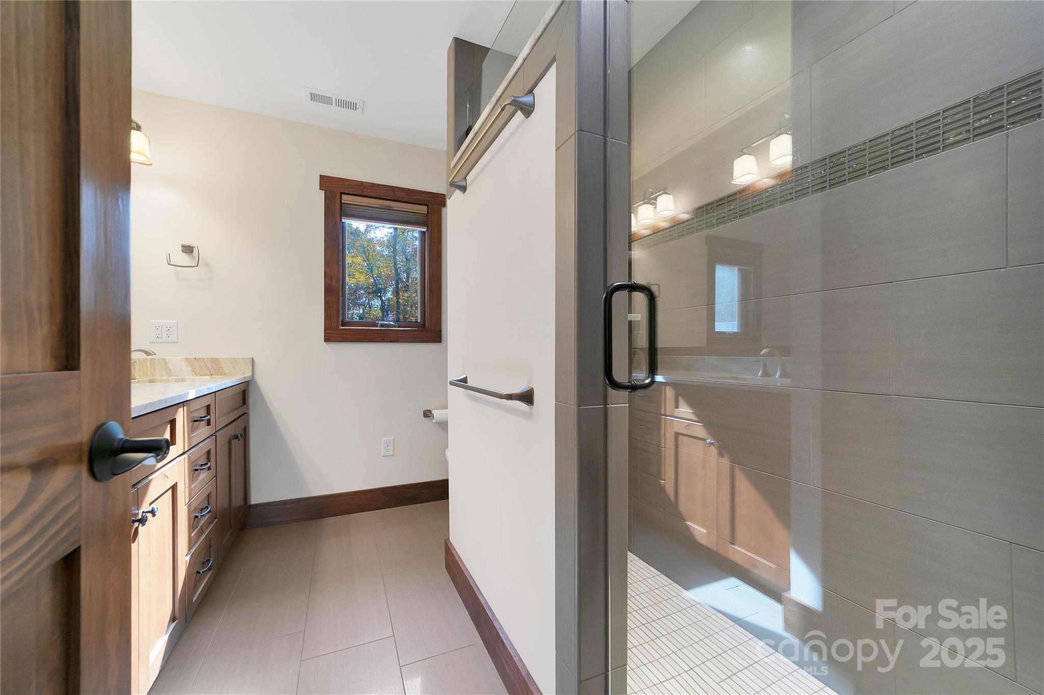 1291 Indian Camp Mountain Road Rosman, NC 28772 - Photo 31 of 48 a view of a bathroom with a sink