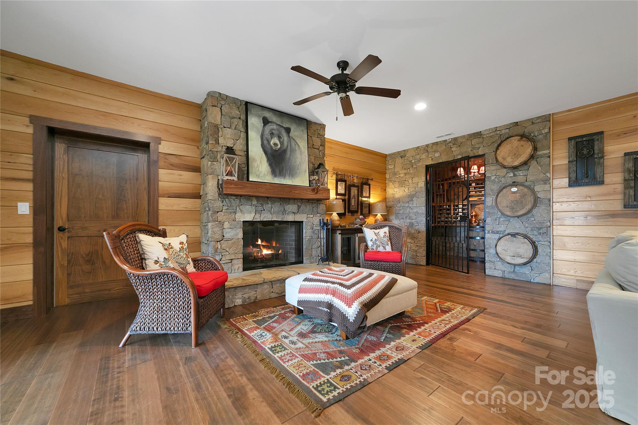 1291 Indian Camp Mountain Road Rosman, NC 28772 - Photo 39 of 48 a living room with furniture and a fireplace