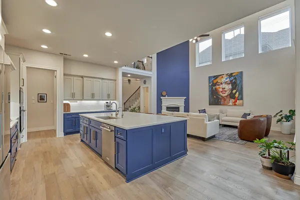 a kitchen with a stove and cabinets