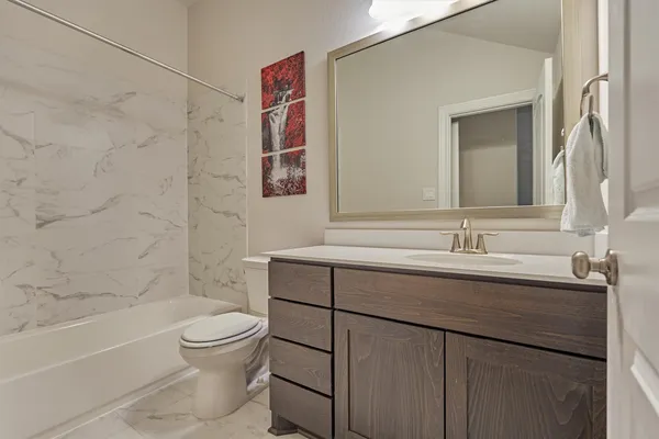 a bedroom with toys and dresser