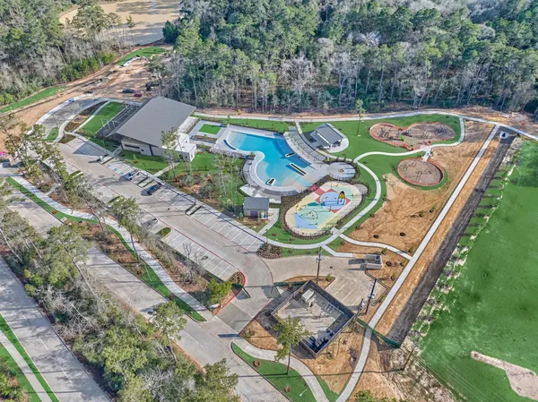 an aerial view of a dinning table and chairs in the patio