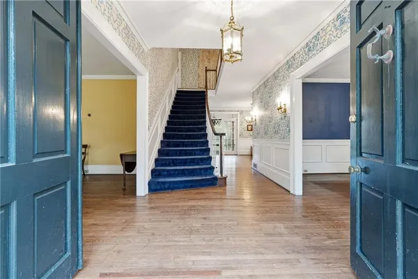 a view of a livingroom with wooden floor