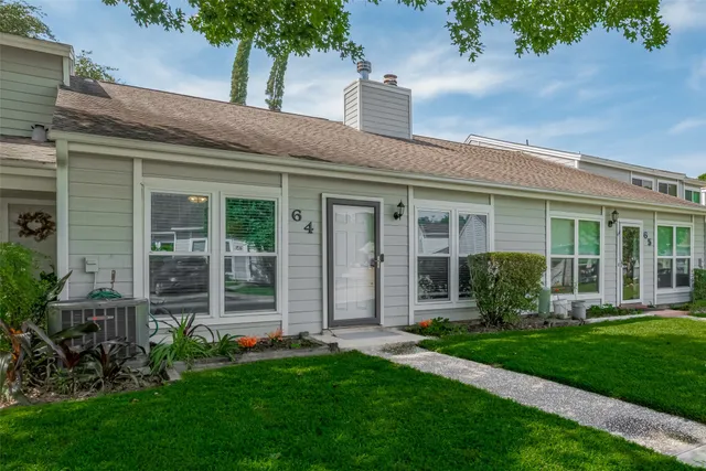 front view of a house with a yard