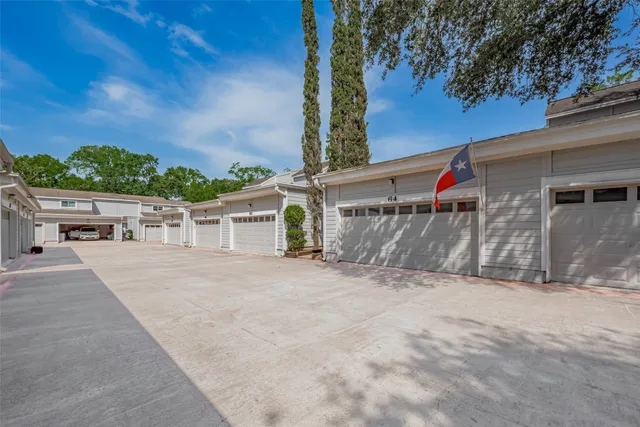 a front view of a house with a yard and porch