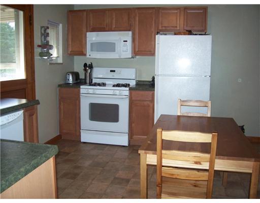 2553 Ridge Rd Extension Economy, PA 15005 - Photo 3 of 13 Kitchen. The gas stove, microwave, dishwasher and refrigerator are included. Steps away is a door to the rear covered porch. A great place for the barbacue!