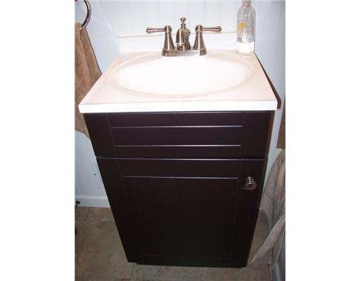 2553 Ridge Rd Extension Economy, PA 15005 - Photo 7 of 13 Other. The new vanity with brushed nickel fixtures has plenty of storage. There is also updated lighting and laminate flooring.