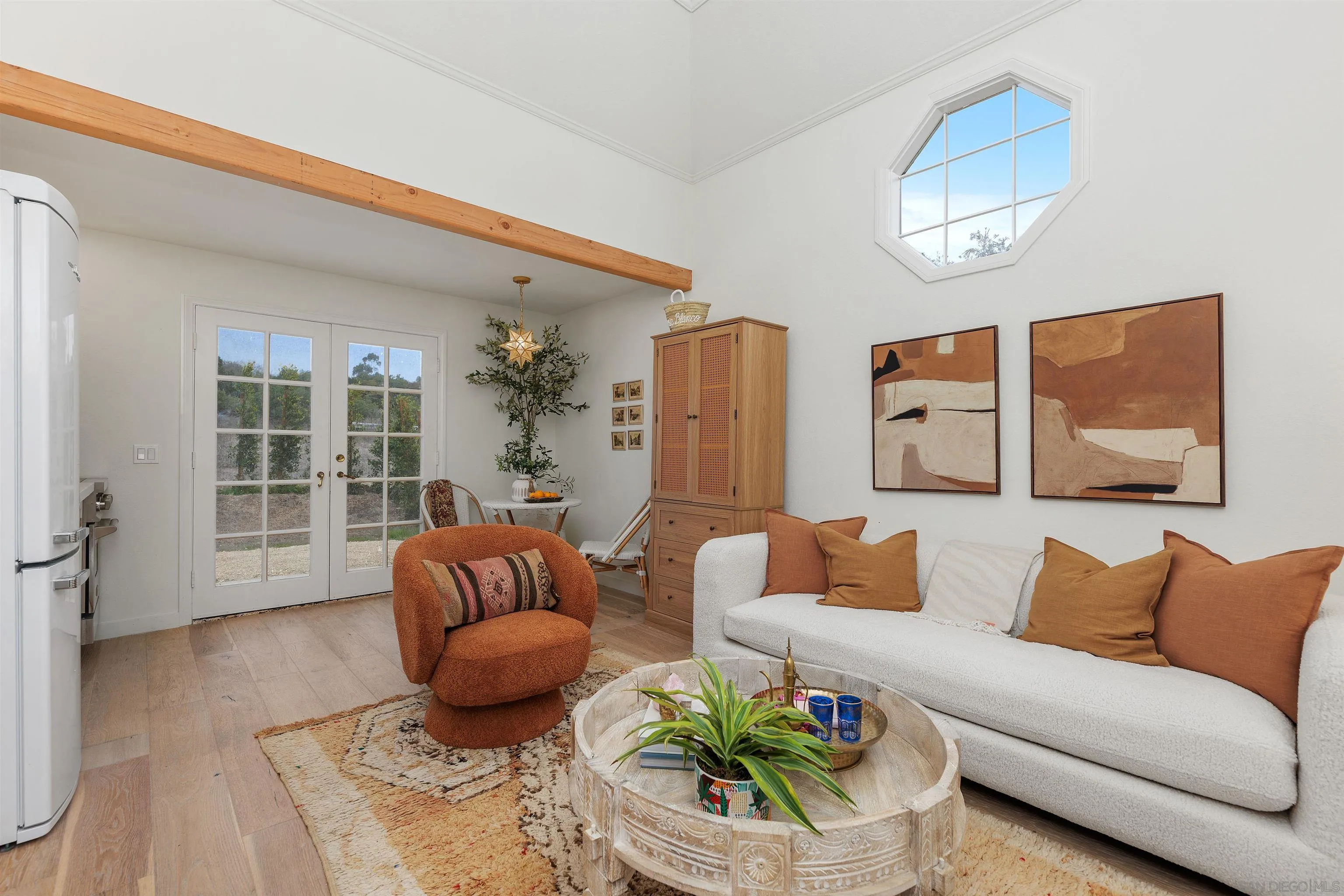 6631 Lago Lindo Rancho Santa Fe, CA 92067 - Photo 4 of 14 a living room with furniture and a large window