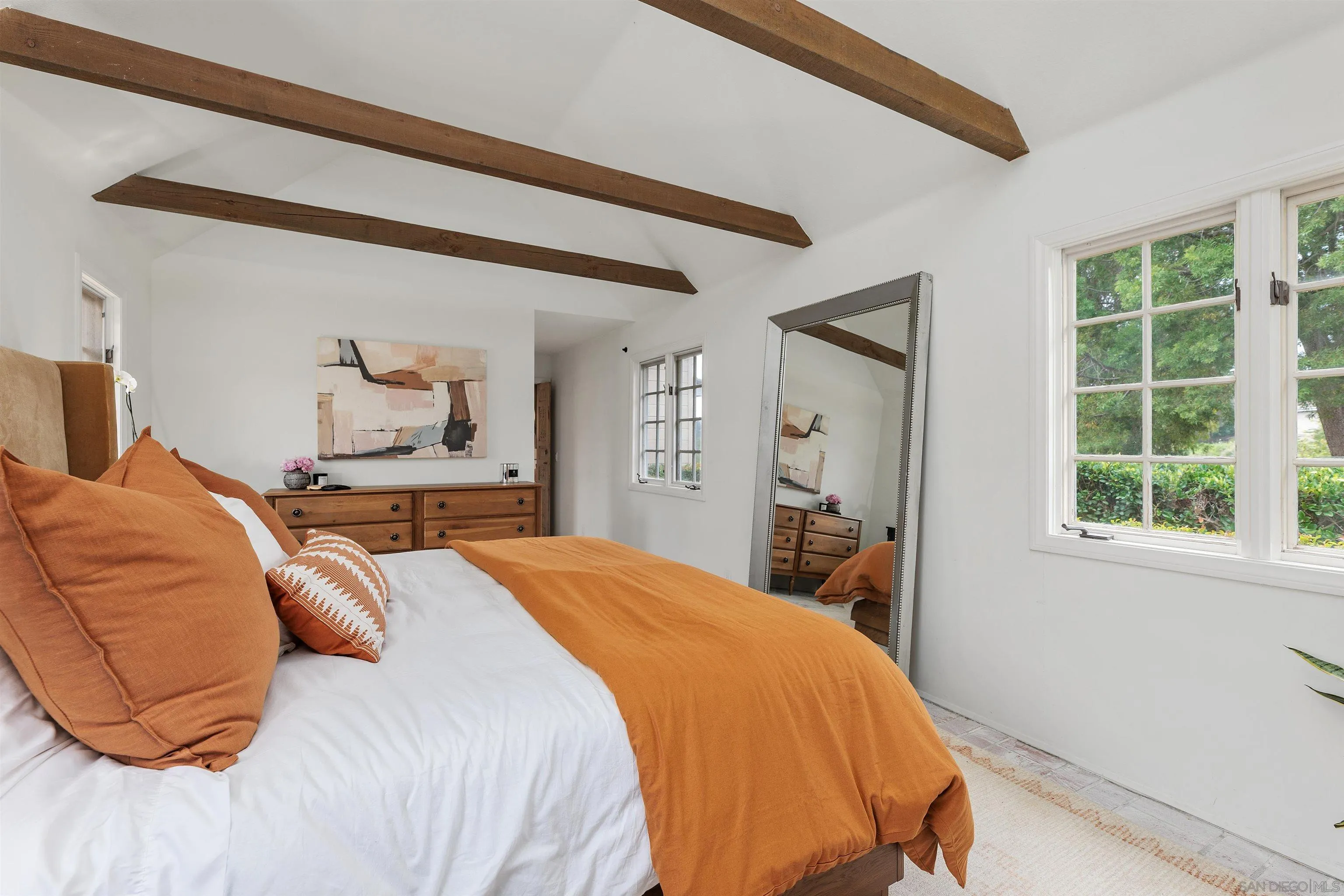 6631 Lago Lindo Rancho Santa Fe, CA 92067 - Photo 10 of 14 a bedroom with a large bed and a window