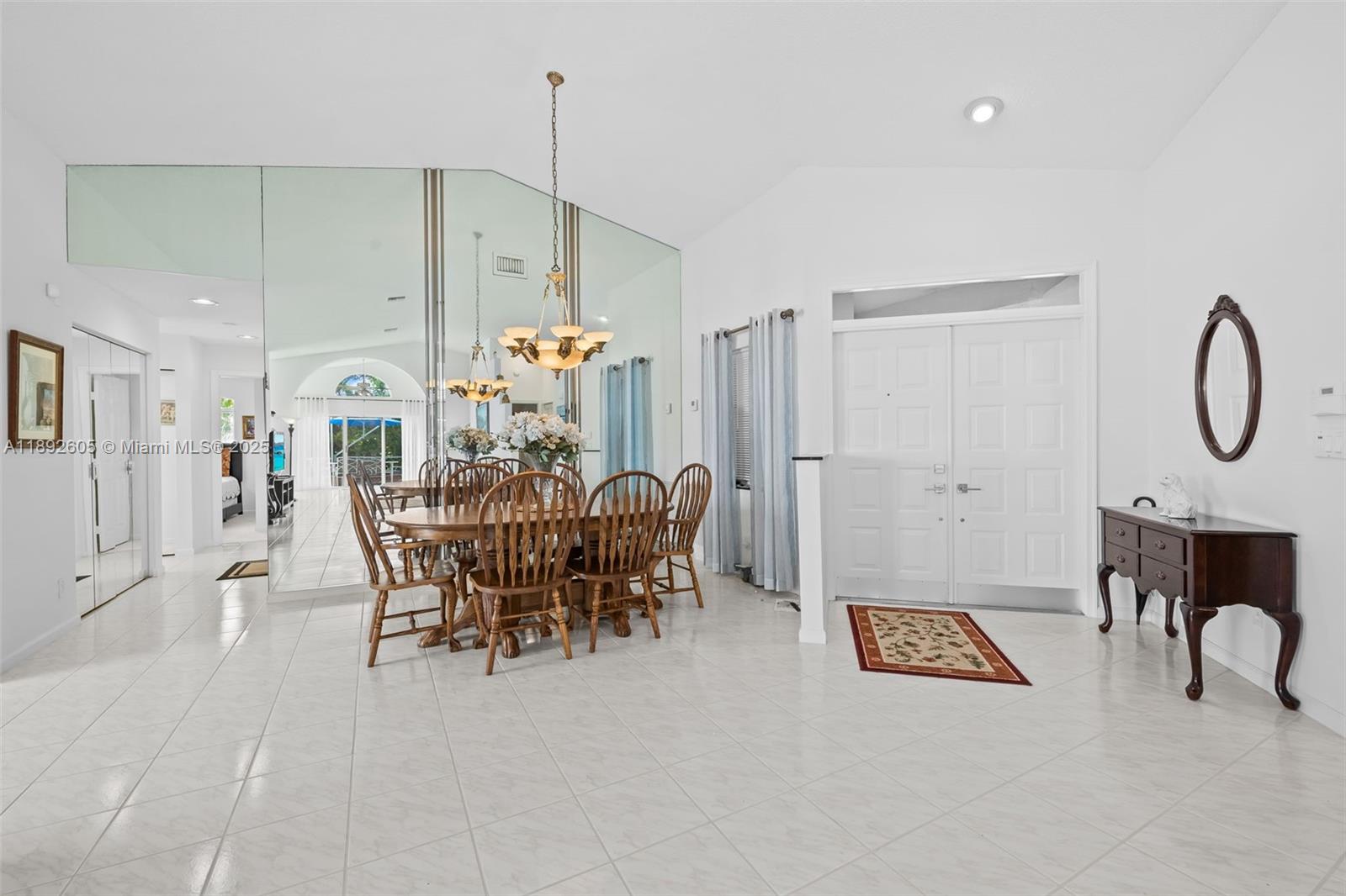 9650 Harbour Lake Circle Boynton Beach, FL 33437 - Photo 2 of 25 a view of a dining room with furniture