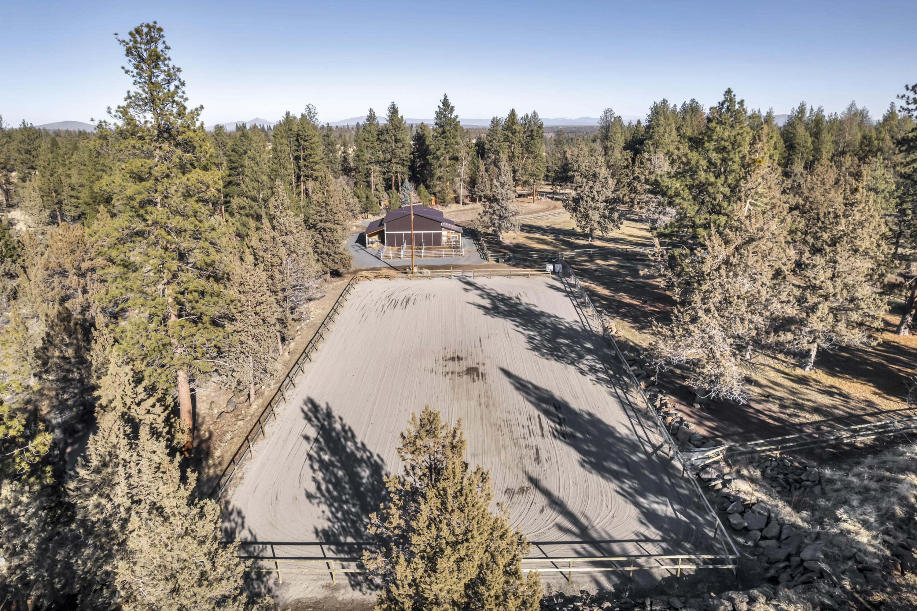 19155 Klippel Road Bend, OR 97703 - Photo 38 of 43 Aerial of arena located just beyond the barn.